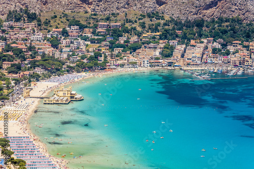 Fototapeta Naklejka Na Ścianę i Meble -  View of the seaside resort town of Mondello in Palermo, Sicily. White beach and turquoise crystal clear sea. HD View of the gulf from the top of Monte Pellegrino.