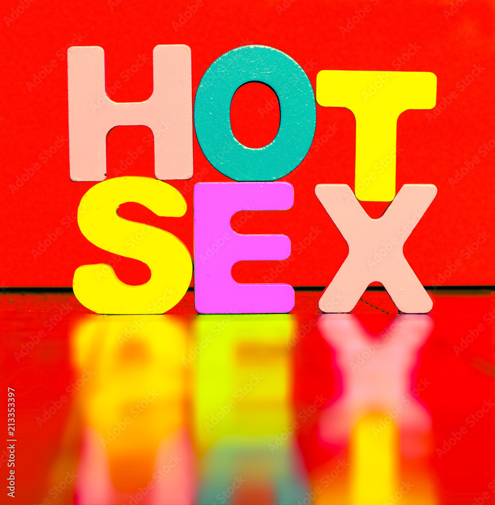 the words HOT SEX with wooden letters on a floor Stock Photo Adobe Stock image image