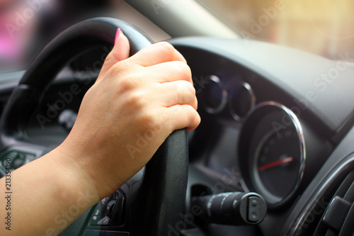Close-up of Man Driving a Car Hand on Steering Wheel © игорь перекрестоd