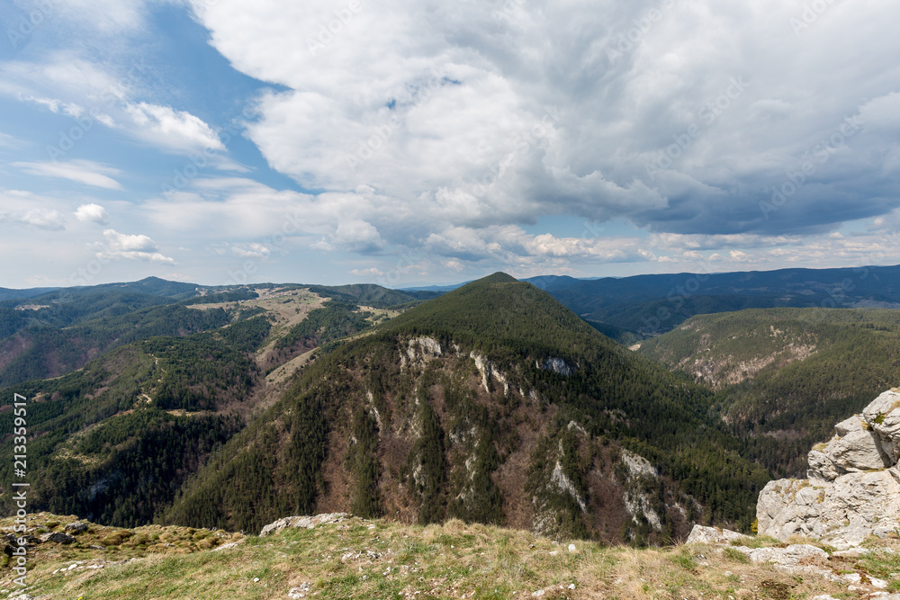 Obraz premium Mountains with sky and clouds