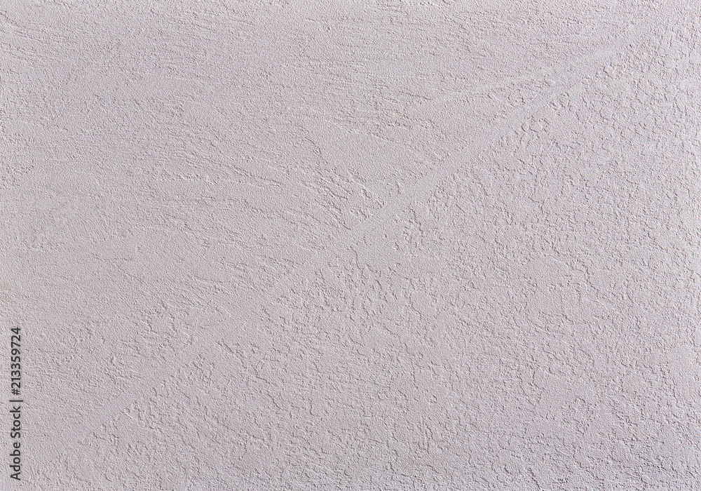 Close-up surface detail of old rough white plaster wall texture, macro. Close-up surface detail of old rough white plaster wall texture, macro.