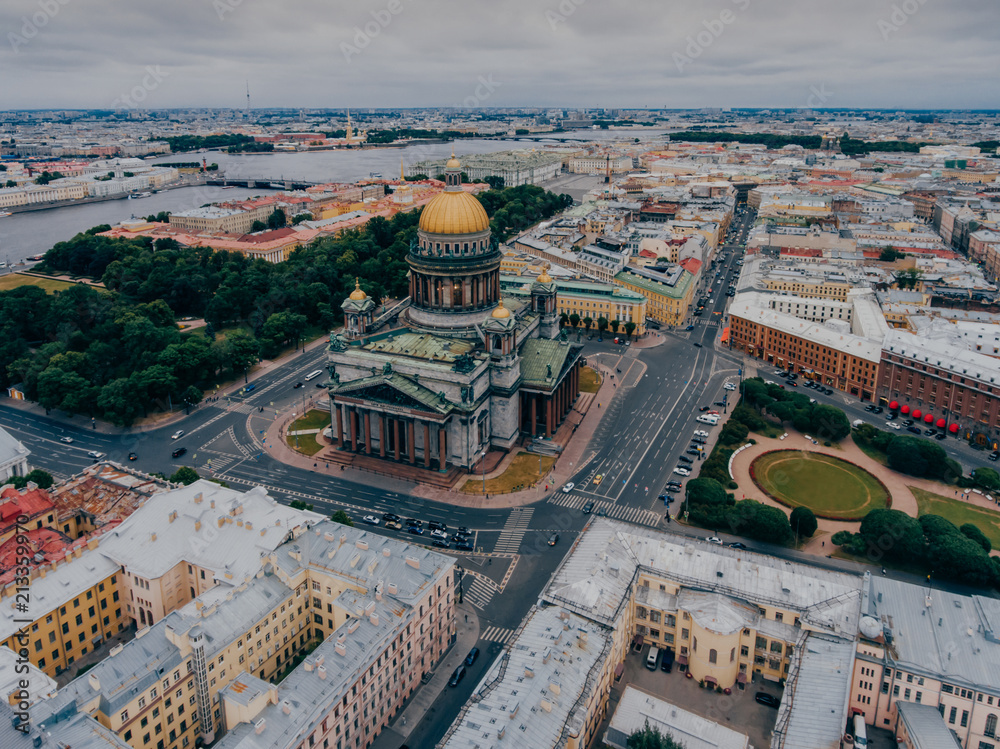 Beautiful view of St. Petersburg from height. St. Isaac`s Cathedral during cloudy day. Streets of Russian cities. Scenic view. Nice city.