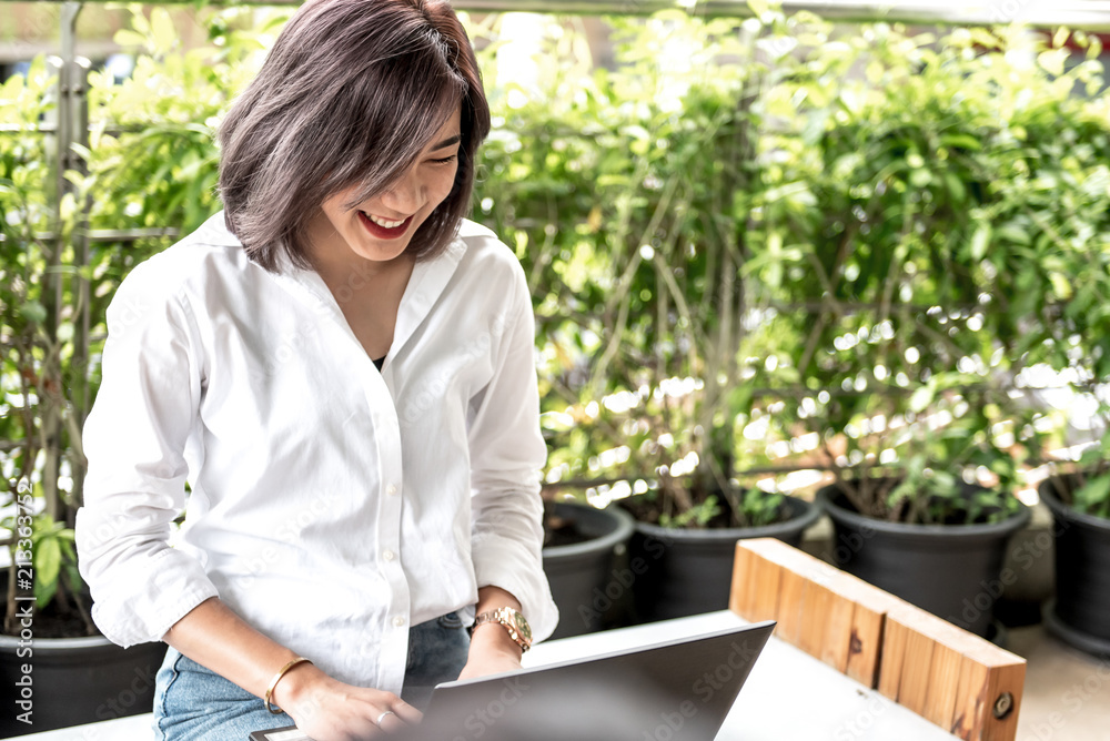 Asian women with notebook.