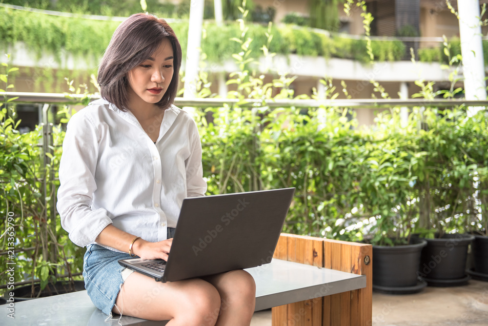 Asian women with notebook. Asian women with notebook.