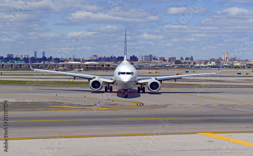 Jet Airliner on tarmac of runway at airport