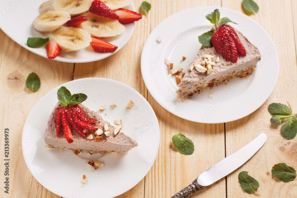 Raw vegan cheesecake with strawberry and banana Raw vegan cheesecake with strawberry and banana