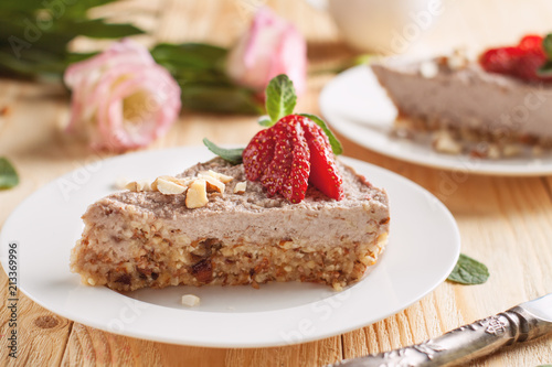 Raw vegan cheesecake with strawberry and banana