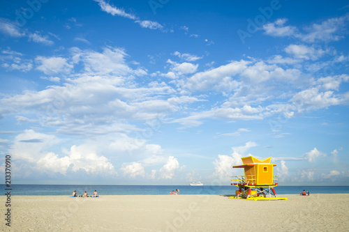 Scenic  view of an iconic yellow and orange lifeguard tower on South Beach, Miami © lazyllama