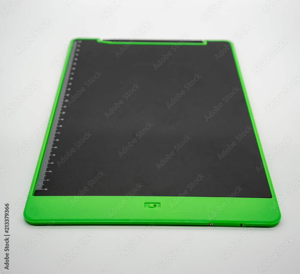 Black and green LCD writing pad tablet isolated on white Black and green LCD writing pad tablet isolated on white