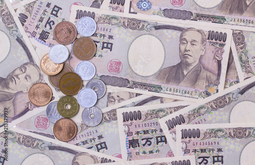 Japanese yen banknotes and Japanese yen coin money concept background photo