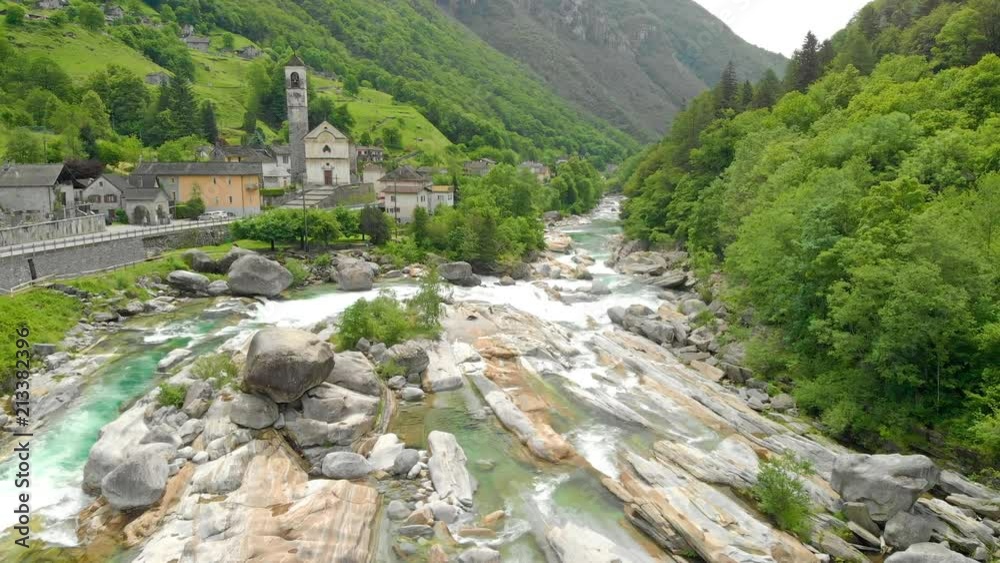 Valle Verzasca - Aerial View of clear and turquoise water stream and rocks in Verzasca River in Ticino - Verzasca Valley in Tessin, Switzerland
