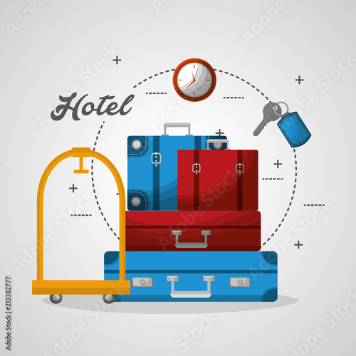 hotel luggage trolley stacked suitcases and clock