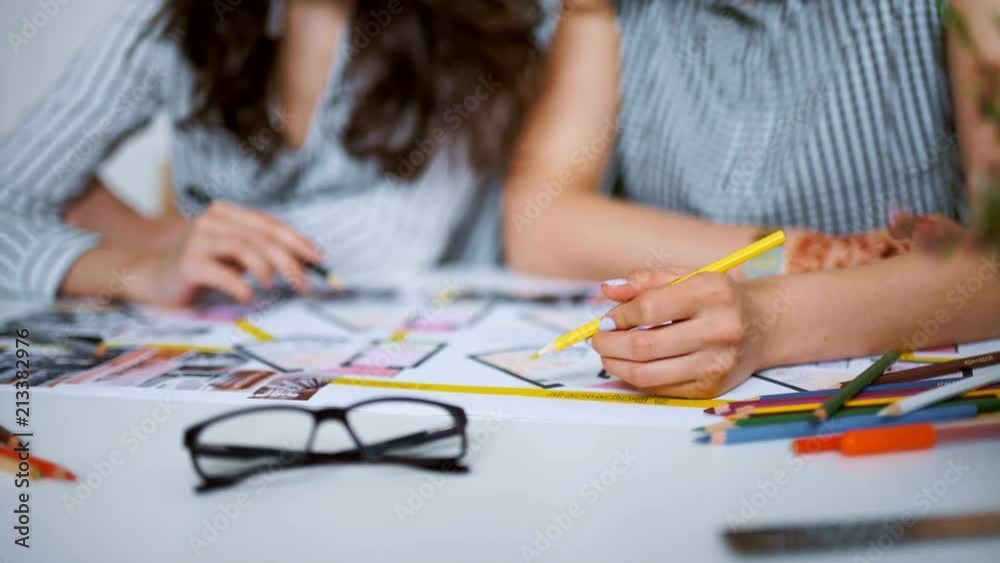 Architect working on blueprint with spesial tools and pencil, close up. female architect at work, only hands with ruler and pencil. Design of the house. Engineer. Tools for drawing. Creating a drawing Architect working on blueprint with spesial tools and pencil, close up. female architect at work, only hands with ruler and pencil. Design of the house. Engineer. Tools for drawing. Creating a drawing