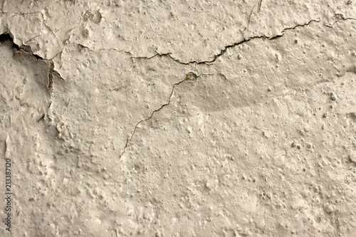 old concrete wall in cracks