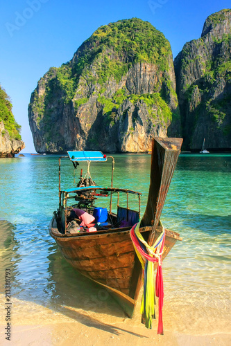 Longtail boat anchored at Maya Bay on Phi Phi Leh Island, Krabi Province, Thailand