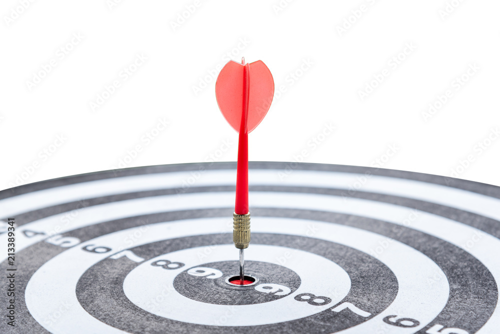 Darts board with a black embroidered red arrow in the middle meant to succeed with the press of a button the goal of business concept. Darts board with a black embroidered red arrow in the middle meant to succeed with the press of a button the goal of business concept.