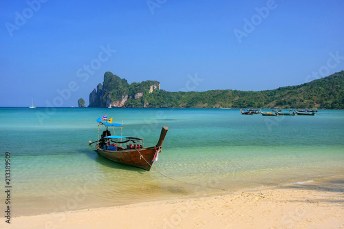Longtail boat anchored at Ao Loh Dalum beach on Phi Phi Don Island, Krabi Province, Thailand