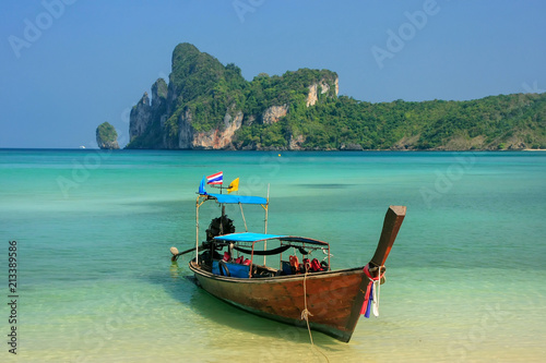 Longtail boat anchored at Ao Loh Dalum beach on Phi Phi Don Island, Krabi Province, Thailand