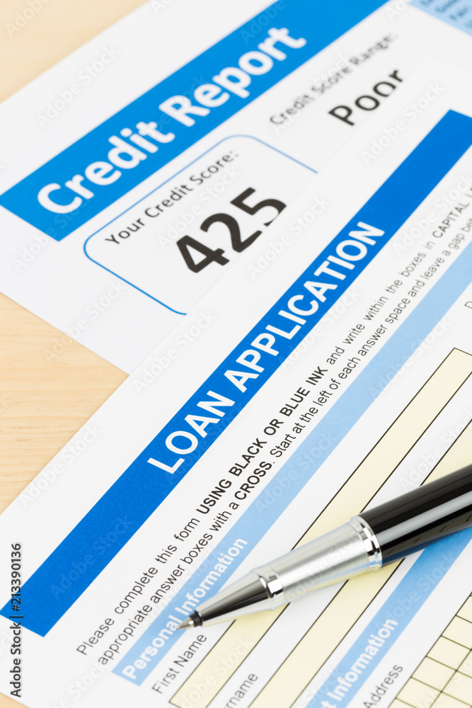 Loan application form poor credit score with pen Loan application form poor credit score with pen