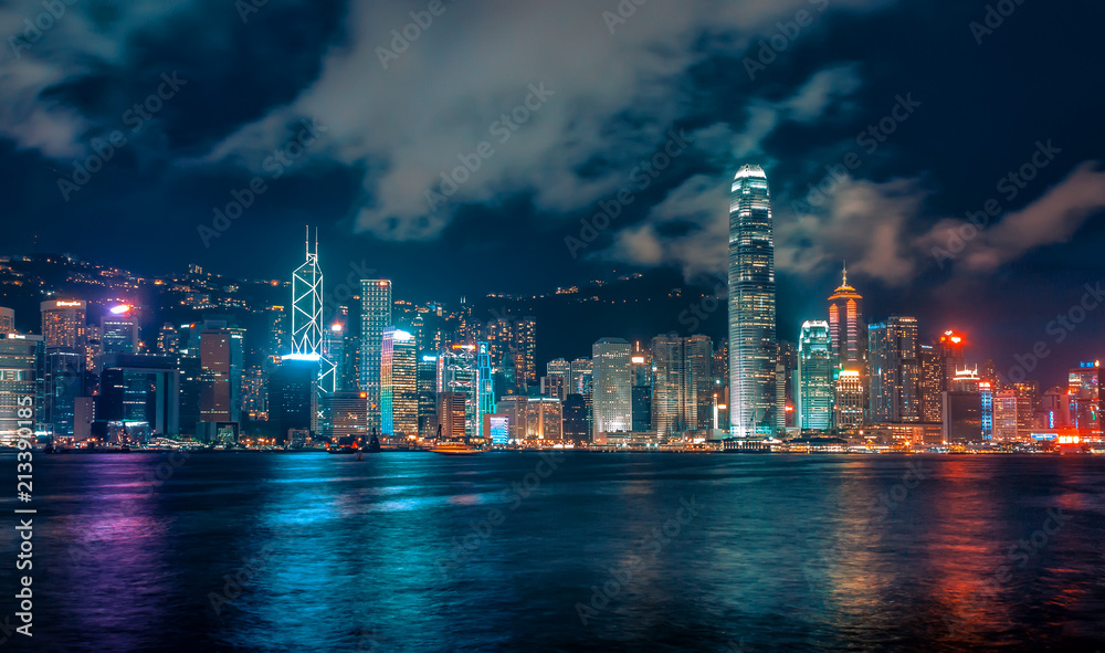 Futuristic City Skyline at Night with Colourful Lights and Reflections, Hong Kong