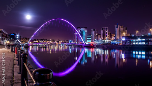 Millennium Bridge under Night Sky and Full Moon, Newcastle upon Tyne, UK photo