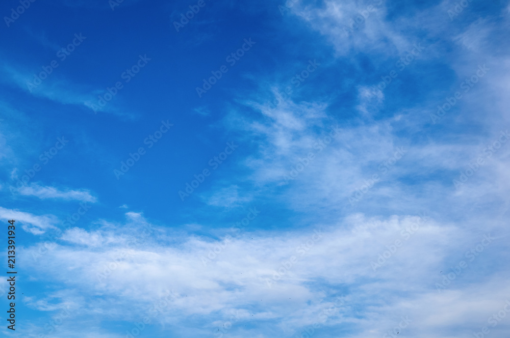 Beautiful blue sky with clouds fleece. Abstract background.