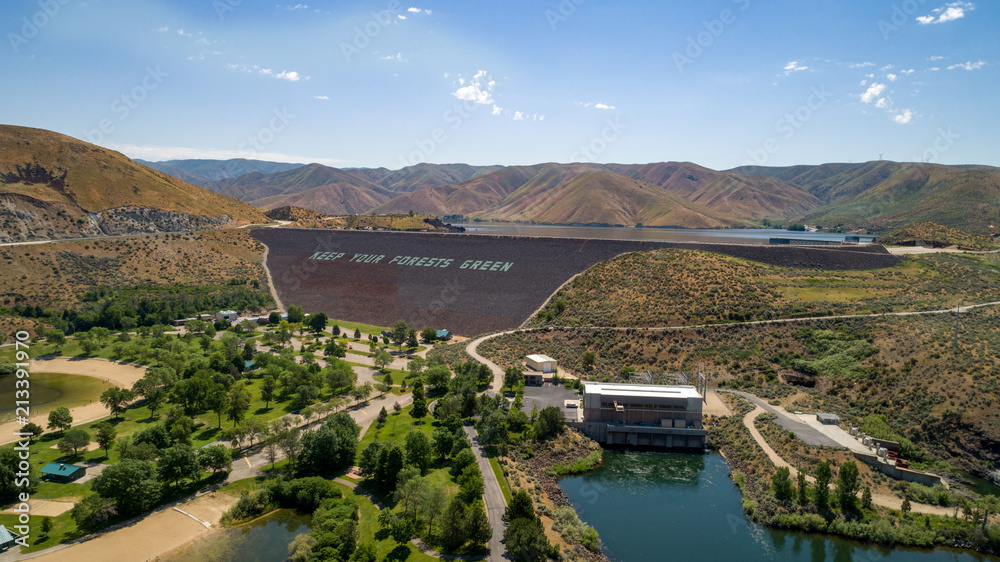 Aerial view of Luck Peak Dam on the Boise River Idaho with a park filled with trees