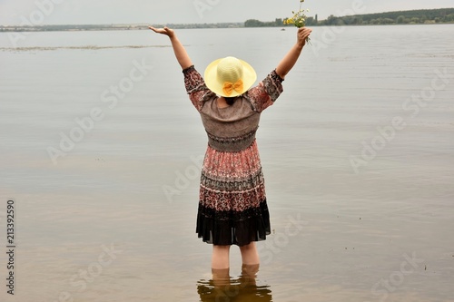a woman by the lake