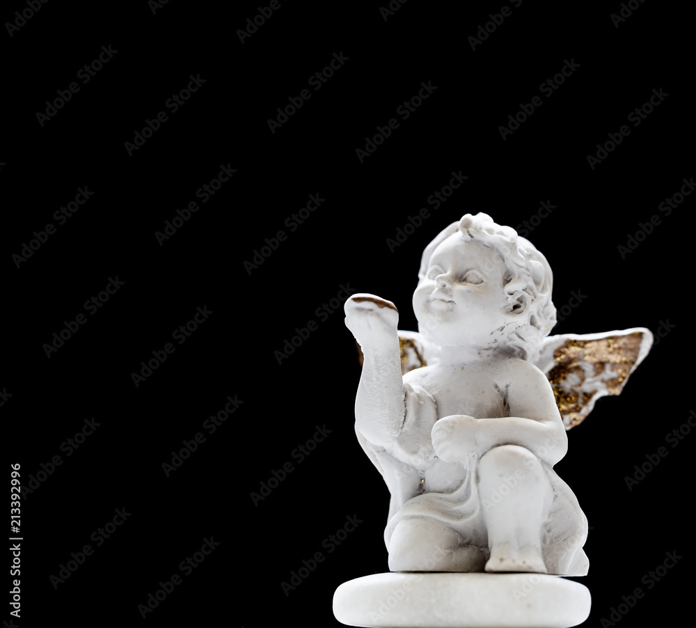 Figurine Of Baby Angel On Black Background 1 Figurine Of Baby Angel On Black Background 1