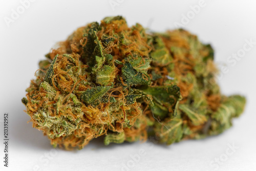 Close up of prescription and recreational indica medical marijuana isolated on monochrome background