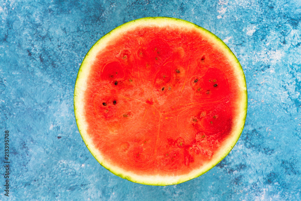 Watermelon cut in half - top view. Refreshing summer fruit Watermelon cut in half - top view. Refreshing summer fruit