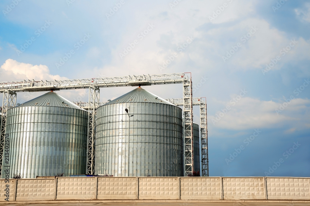 Row of modern granaries for storing cereal grains Row of modern granaries for storing cereal grains