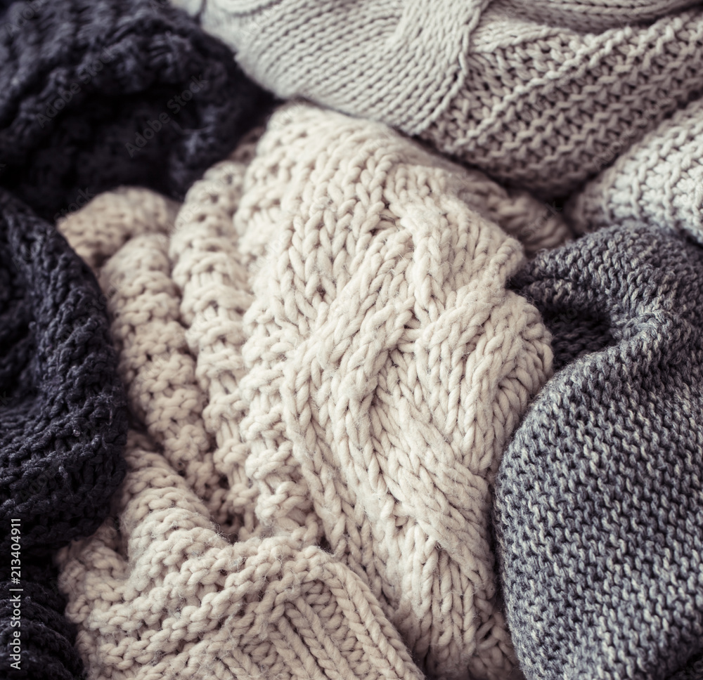 Knitted sweater on a wooden background Knitted sweater on a wooden background