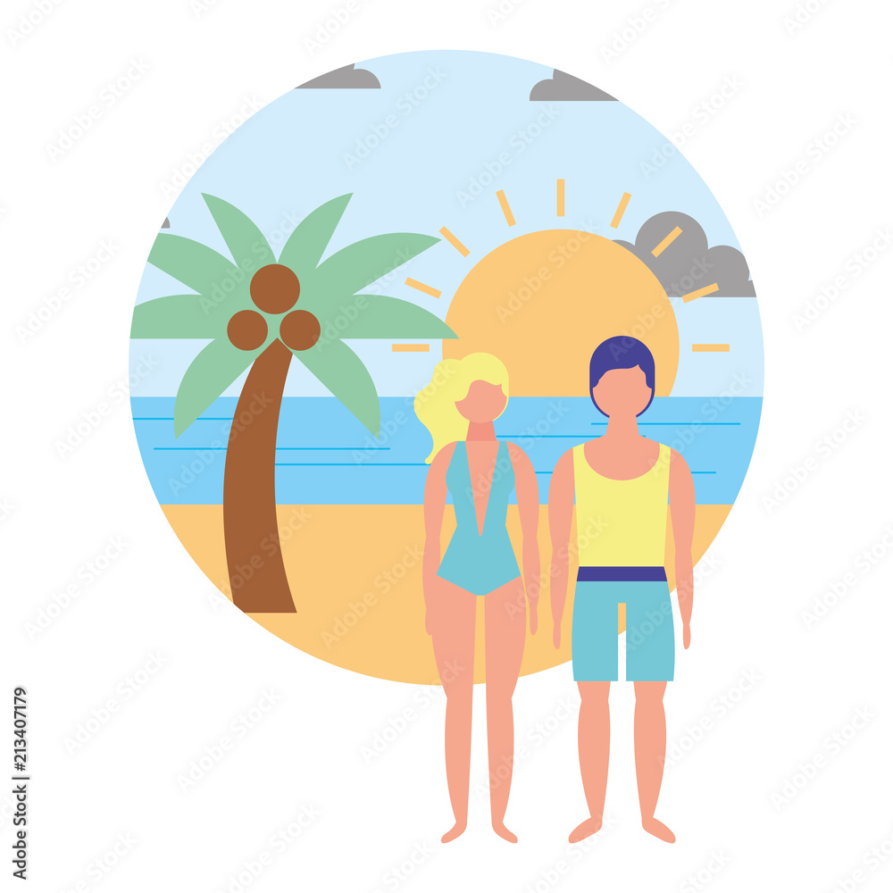 young couple with swimsuit in beach