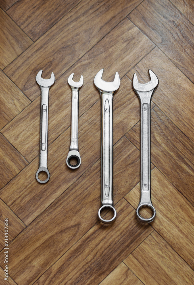 Wrenches on wooden texture Wrenches on wooden texture