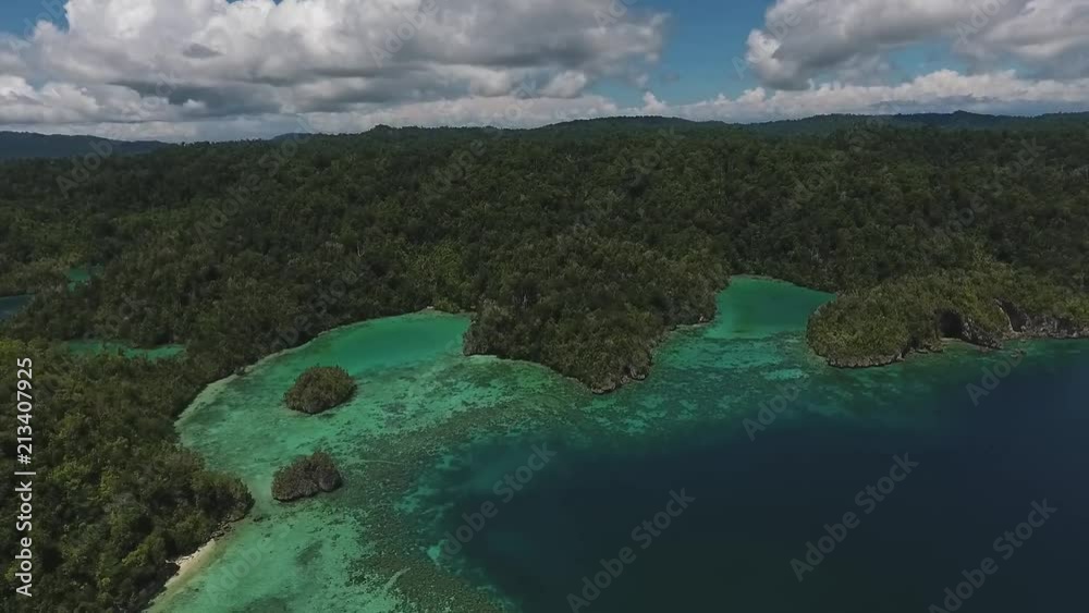 Hidden blue lagoon | Aerial shot | Jib/crane Hidden blue lagoon | Aerial shot | Jib/crane