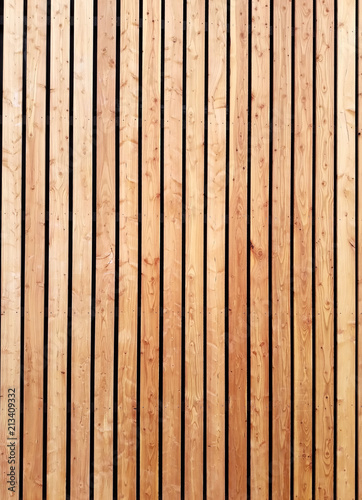 The siberian larch facade is made of wooden planks