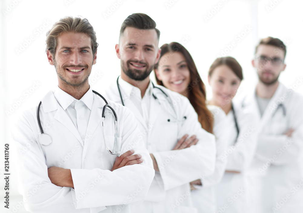 Portrait of medical team standing with arms crossed in hospital Portrait of medical team standing with arms crossed in hospital