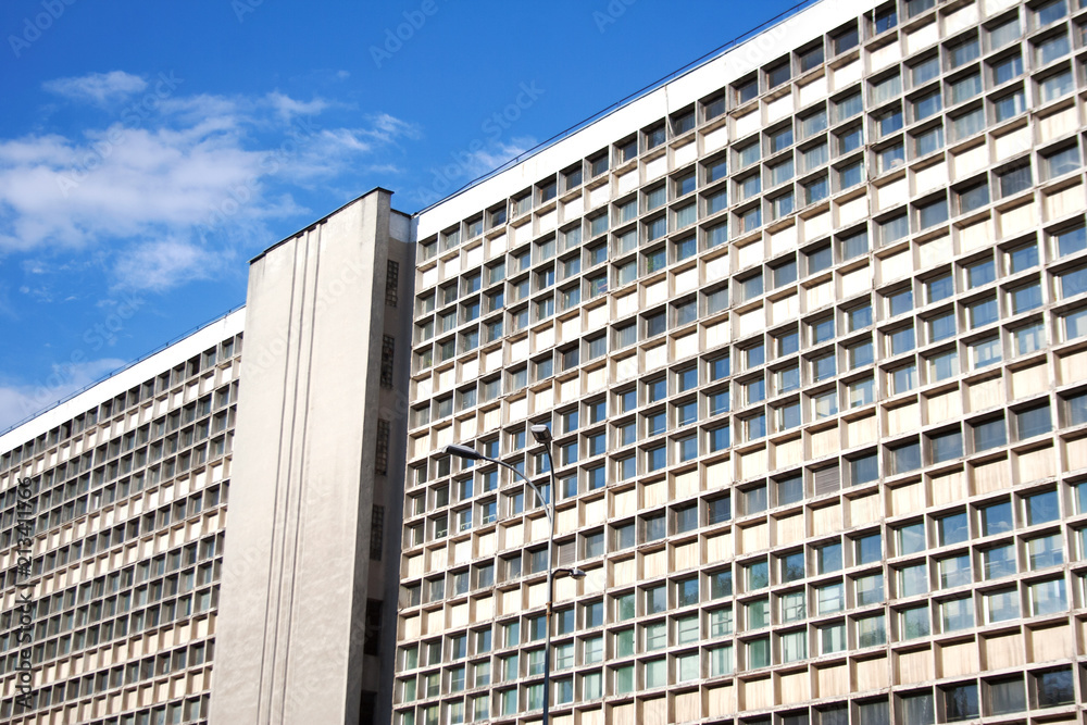 Fototapeta premium Industrial building facade with numerous rectangular windows