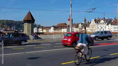 Buses and cars on the city road and old houses, Lucerne, Switzerland