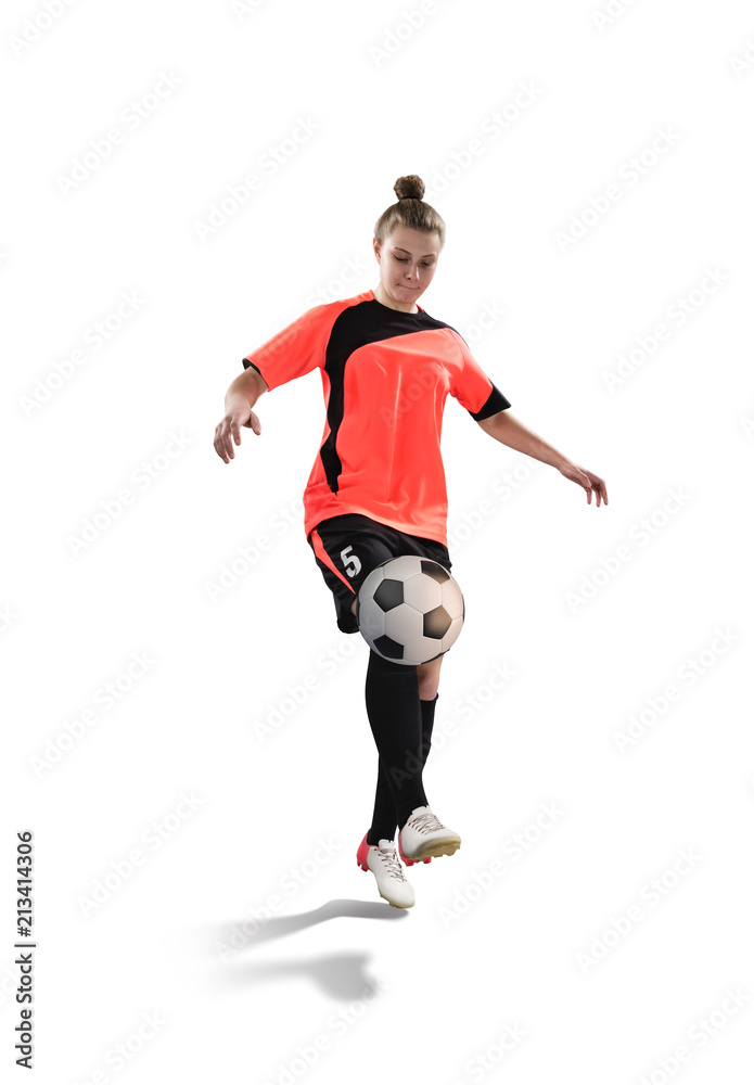 female soccer player is juggling with a ball isolated on white