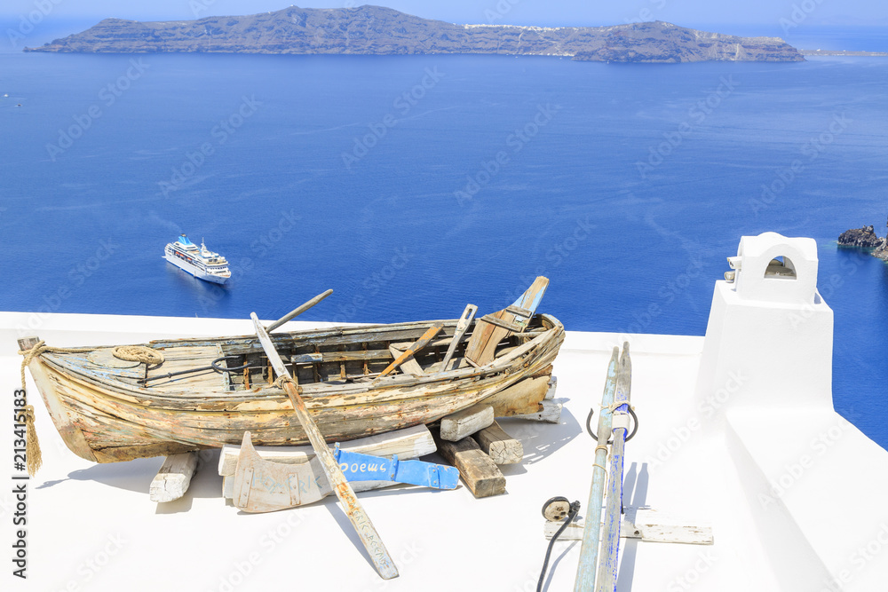 Old and new ship in Thira, Santorini, Greece Old and new ship in Thira, Santorini, Greece
