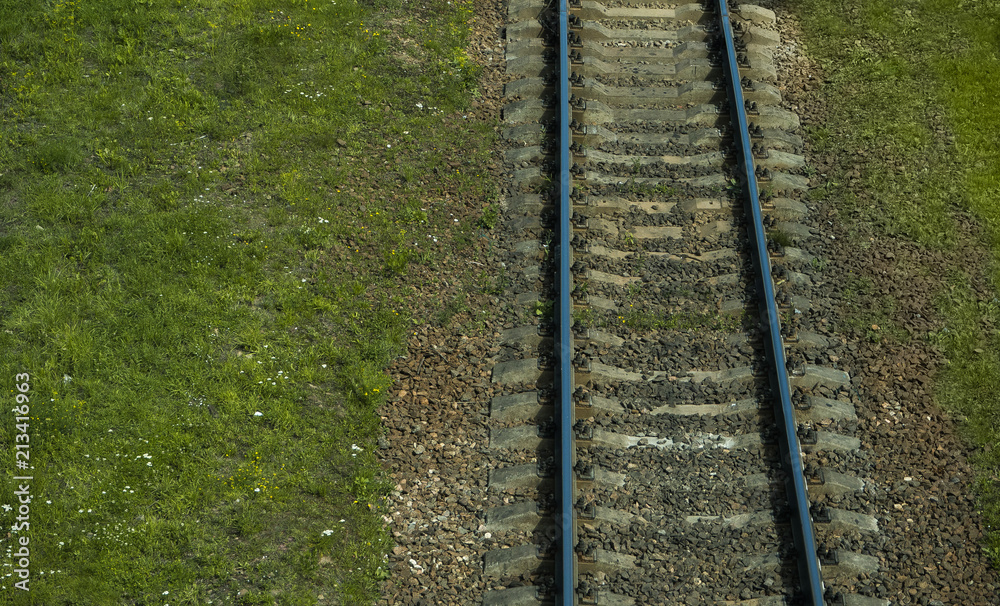 Aerial view of railway track through countryside.