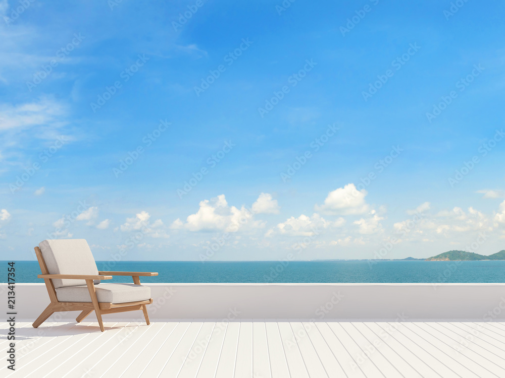 Modern white terrace 3d render,There are white wooden floor.Furnished with white fabric chair.There have bright sunlight and beautiful sea view.