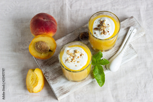 Wallpaper Mural Peach dessert (mousse) with natural yoghurt, walnuts and mint in portion glasses Torontodigital.ca