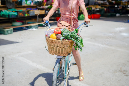 People buying fruits and vegetables ingredient. Summer outdoors farm market shopping background. Casual purchasing selling real natural healthy lifestyle candid closeup image photo