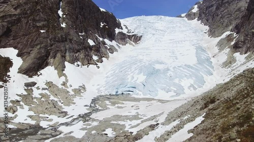 Tuftebreen - glacier in Norway is nearby to Steinmannen and Bakli. Aerial view. photo