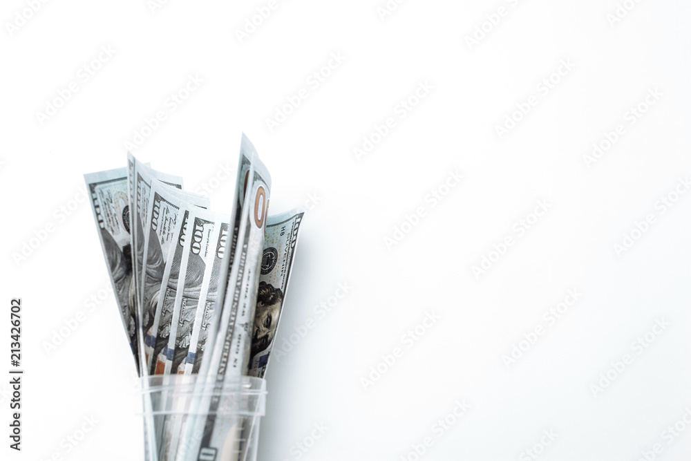 Many bills of 100 dollars, American banknote, white background with money cash currency close-up, the President's face Many bills of 100 dollars, American banknote, white background with money cash currency close-up, the President's face