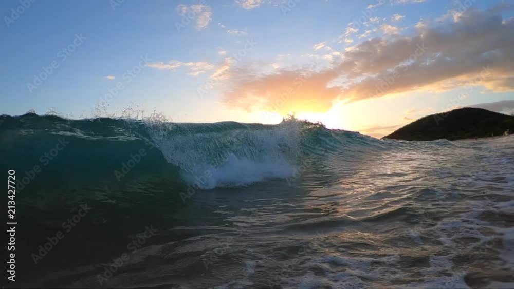 Beautiful slow motion wave at Makena Big Beach during sunset. Beautiful slow motion wave at Makena Big Beach during sunset.