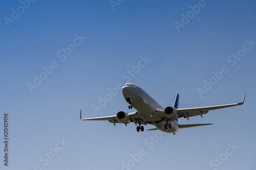 Twin engined jet airliner on final approach for landing